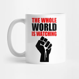 THE WHOLE WORLD IS WATCHING Mug